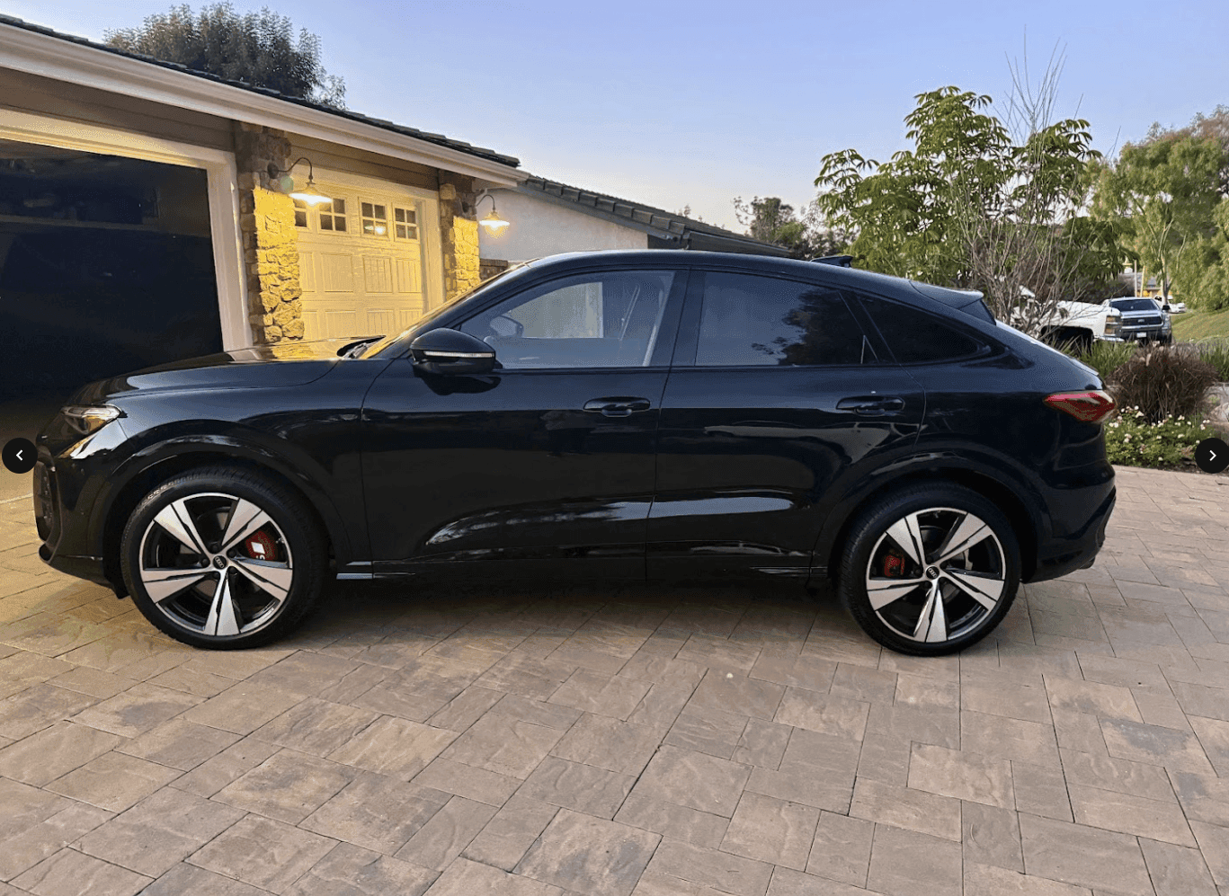 2026 black Audi Q5 residential driveway